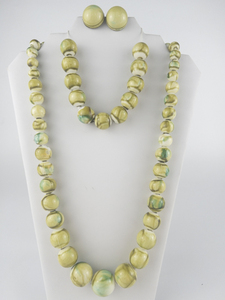 lot 314 image: Set of three Hong Kong Green & White Synthetic Bead Necklace, Bracelet, & Clip-On Earrings Ensemble .