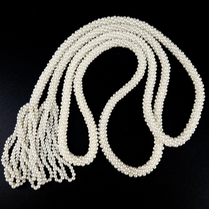 lot 316 image: Crochet Seed Pearl Sautoir Necklace.