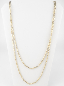 lot 353 image: Monet Long Twisted Gold Tone Base Metal Opera Necklace.