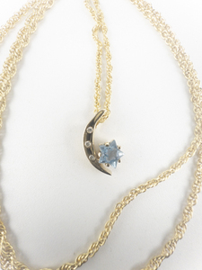 lot 354 image: Joan Rivers Blue Cz Star & Moon Gold Tone Base Metal Pendant Necklace .