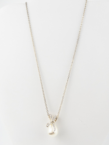 lot 359 image: Pearl & Crystal Accented Bow Gold Tone Base Metal Pendant Necklace .