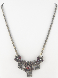 lot 364 image: Victorian Trading Co Art Deco Red Rhinestone & Seed Pearl Bronze Base Metal Necklace.