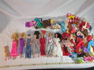 lot 29 image: Vintage Mattel Barbie Dolls Lot with Accessories Assorted Clothing
