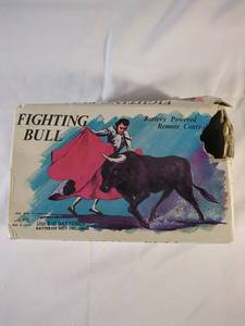 lot 39 image: Vintage Alps Battery Powered Remote Control Fighting Bull Toy with Original Box