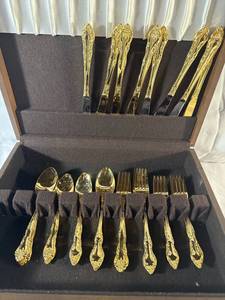 lot 47 image: Vintage Gold-Plated Flatware Set with Elegant Design in Wood Case