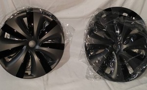 lot 121 image: Four Tesla Wheel Covers Set in Excellent Condition