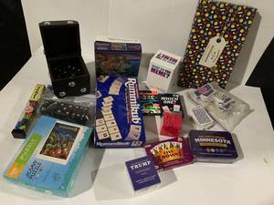 lot 105 image: Diverse Board and Card Games Lot Featuring Puzzles, Rummikub, and More 1000 pcs
