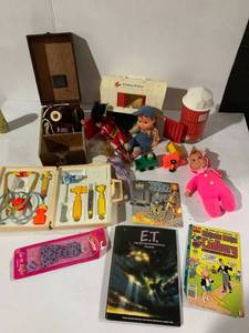 lot 160 image: Vintage Toy Lot with Fisher-Price, Barbie, Star Wars Books, and More Collectibles