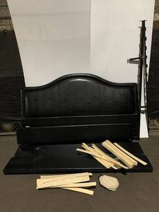 lot 164 image: Room & Board Black Upholstered Bed with Rails, Wear Visible