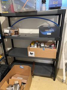 lot 281 image: Plastic Storage Shelve Only. contents not included.