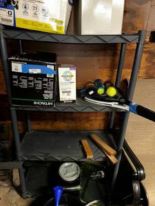 lot 375 image: Sturdy black plastic shelving for efficient organization. Contents not included