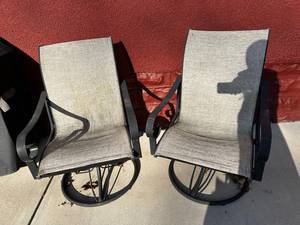 lot 381 image: Outdoor Swivel Patio Chairs Pair
