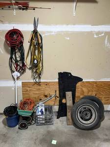 Garage Wall Contents - Air Hoses, Extension Cords, Jumper Cables, Work Light and More