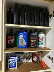 Garage Cabinet Contents - Huge Lot of Motor Oil, Oil Filters, and Transmission Fluid Lot