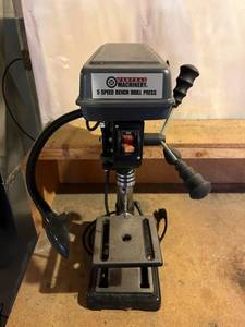 Central Machinery 5 Speed Bench Drill Press in Good Working Condition - Located in Basement.  Bring Help to Remove