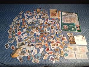 lot 33 image: Vintage stamps and 1988 postcard