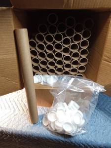 lot 94 image: Box of cardboard tubes with lids