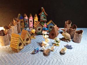 lot 85 image: Ceramic bird houses, birds and log vases