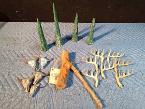 lot 68 image: Ceramic trees and bull skulls, resin antlers and wood carving