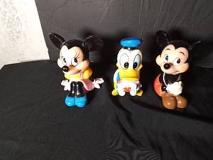 lot 126 image: 1960s Walt Disney banks made in Korea with plugs
