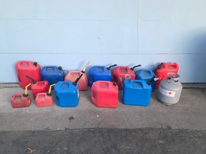 lot 12 image: Lot of Fuel Cans and 1 Propane Tank