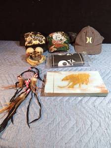 lot 171 image: 3 caps, skull ashtray & wallpaper trim, engraved picture on wood and dream catcher