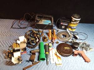 lot 181 image: Battery charger, tire pump, tools, locks with keys, wipes, robe hook, tape, furniture extenders and more