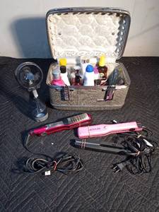 lot 208 image: Make-up case full of make-up, bath products, hair products, 3 straighteners, curling wand and more