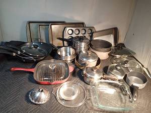 lot 210 image: Cast iron grill pan, bake ware, pots, pans, lids, wok and more