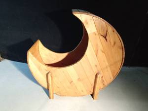 lot 24 image: Home made knotty pine half moon shaped bassinet