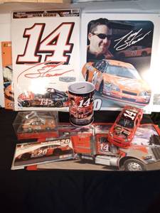 lot 416 image: Tony Stewart metal sign, decals, 2 diecast cars, bank, note cards and more