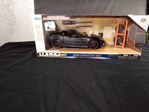 lot 246 image: 2006 Diecast Corvette Z06 with tire rack, screwdriver, 2 extra axles, 4 extra wheels