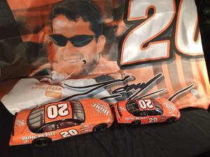 lot 248 image: 2 Tony Stewart #20 Collectable cars and a Tony Stewart banner