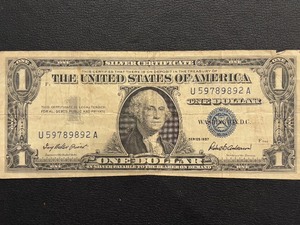 lot 100 image: 1957 Blue Seal $1 Dollar Silver Certificate