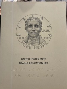 lot 54 image: 2009-P Louis Braille Silver Dollar