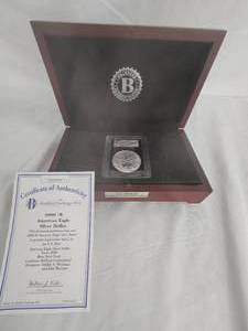 lot 36 image: 2000-W American Eagle Silver Dollar