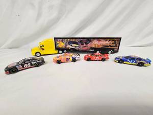 lot 100 image: Dale Earnhard Bass Pro Semi and 4 cars