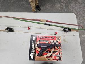 lot 263 image: . Air GunDart Kit, bows and fishing poles