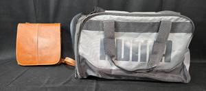 lot 32 image: Puma Sports Duffel Bag and Leather Crossbody Purse Set