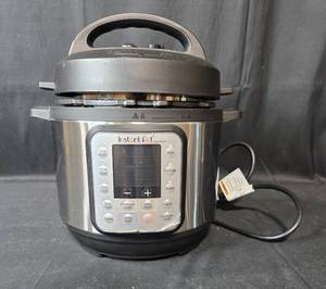 lot 75 image: Instant Pot Duo Nova 3 Quart Electric Pressure Cooker with Accessories