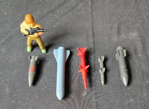 lot 108 image: Vintage Army Action Figure with Missiles Set