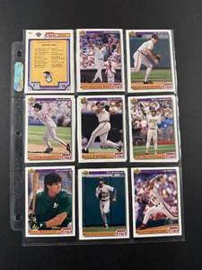 lot 89 image: Lot of Vintage Baseball Trading Cards Including Ken Griffey Jr., Wade Boggs, and Jose Canseco