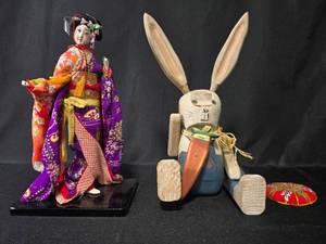 lot 13 image: Vintage Japanese Doll with Stand and Wooden Bunny Figurine