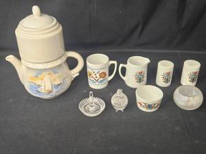 lot 107 image: Hand-Painted Porcelain Tea Set with Decorative Accessories