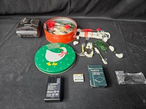 lot 112 image: Craft Supplies Lot with Threads, Buttons, and Fujifilm Battery