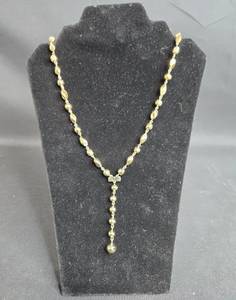 lot 142 image: Elegant Gold Tone Beaded Necklace with Cross Pendant