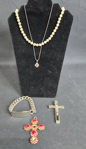 lot 144 image: Vintage Jewelry Lot Including Pearl Necklace, Cross Pendant, and Silver Bracelet