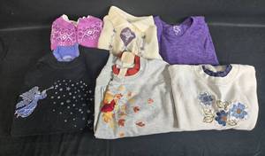 lot 176 image: Lot of Womens Sweaters and Tops in Various Styles and Colors