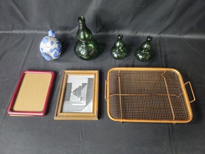 lot 129 image: Collection of Vintage Items Including Glass Bottles, Framed Art, and Wire Rack