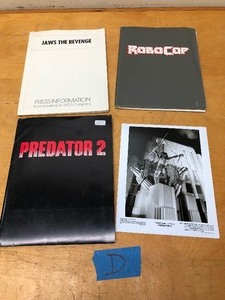 lot 257 image: 3 Original Hollywood Movie Complete Press Kits - Robocop, Jaws the Revenge & Predator 2